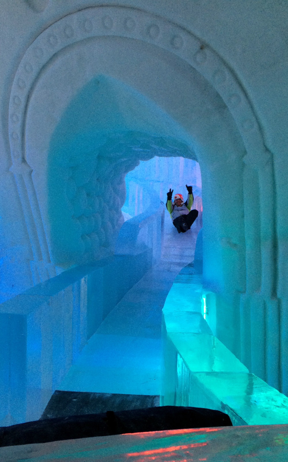 Robin on Slide in Hôtel de Glace :: A Night of Ice in Québec City :: I've Been Bit! A Travel Blog