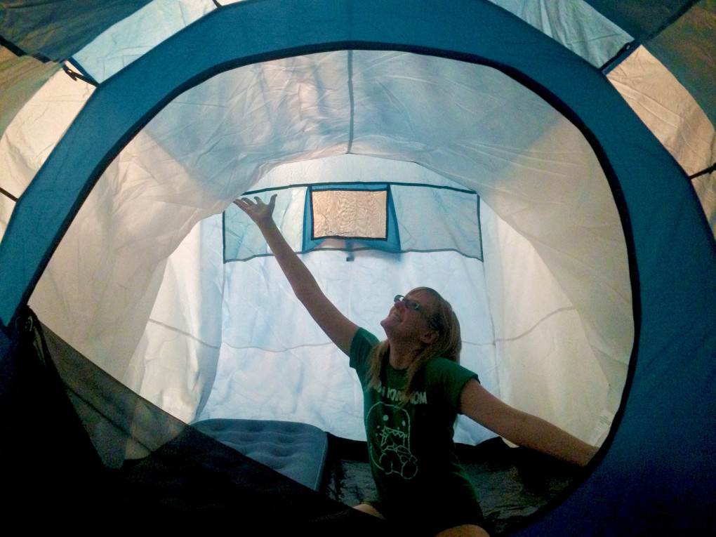 Lindsay sitting in her blue tent :: I've Been Bit! Travel Blog