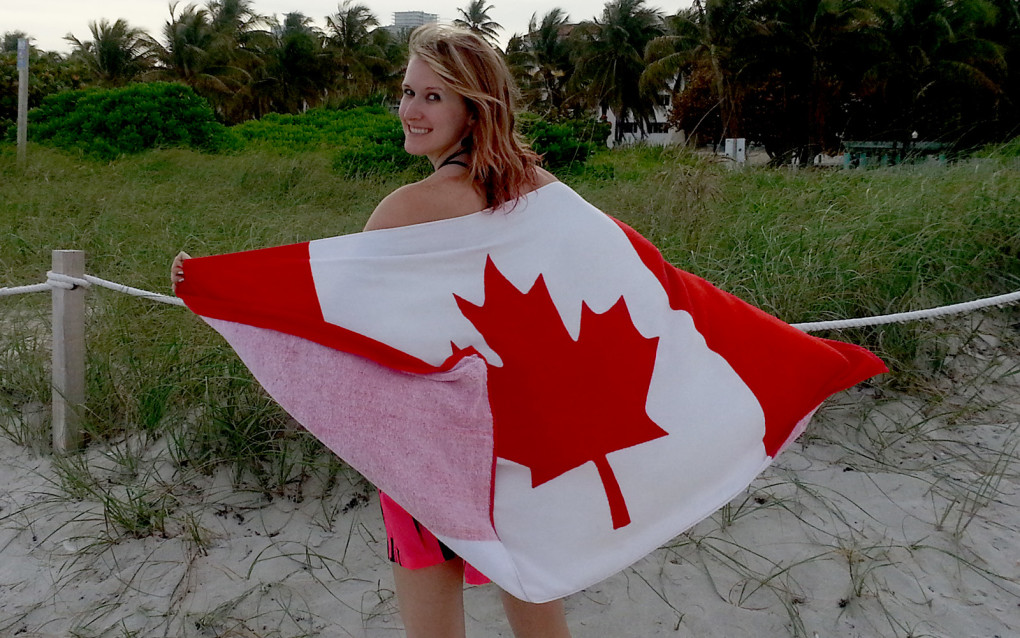 Lindsay Holding a Canadian Flag Towel :: I've Been Bit! Travel Blog