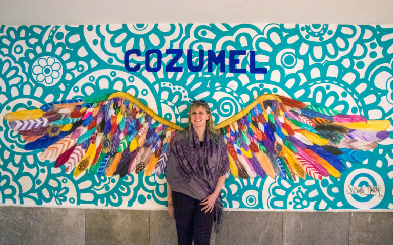 Lindsay with Cozumel Wings at Cozumel Airport in Mexico :: I've Been Bit! A Travel Blog