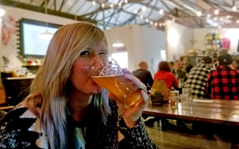 Lindsay Enjoying a Pint at Descendents Brewery in Kitchener :: I've Been Bit! Travel Blog