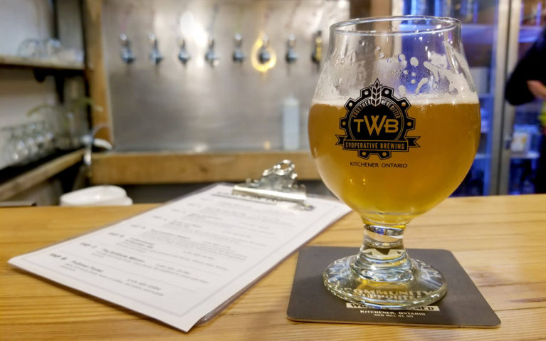 TWB Brewing's Syncopation Saison in Front of the Bar :: I've Been Bit! Travel Blog