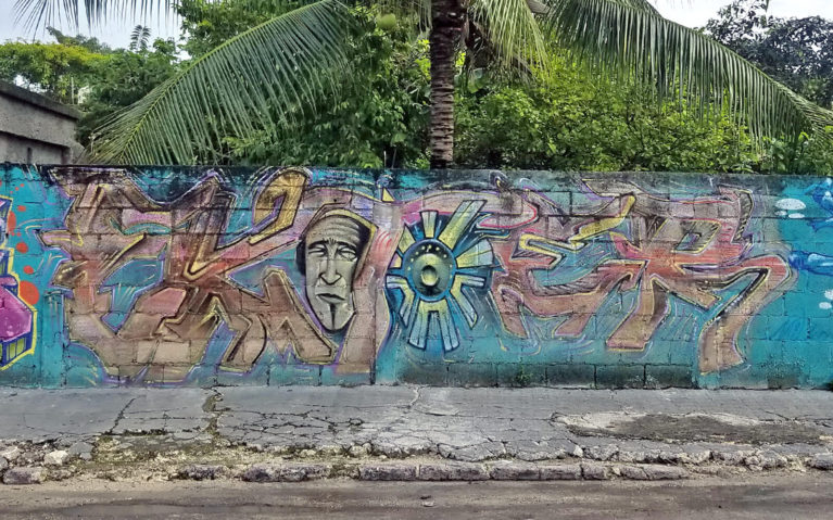 Man with Shield Mural in Cozumel Mexico :: I've Been Bit! Travel Blog