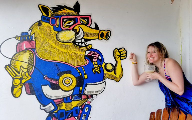 Lindsay Hanging Out with the Papa Hog Mural :: I've Been Bit! Travel Blog