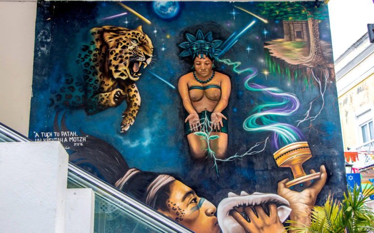 Mural with a Man and Woman Praying, Summoning a Leopard Spirit in Cozumel, Mexico :: I've Been Bit! Travel Blog