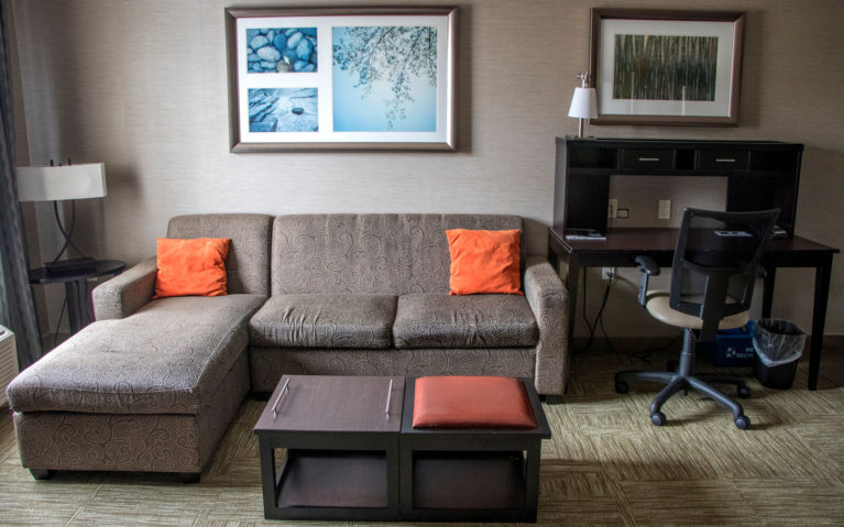 Sofa and Desk inside the Staybridge Suites Hotel Room in Hamilton, Ontario :: I've Been Bit! Travel Blog