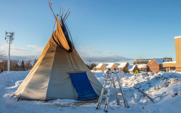 Sacred Fire Outside of the Gathering at the Rapids Pow Wow at Algoma University :: I've Been Bit! Travel Blog