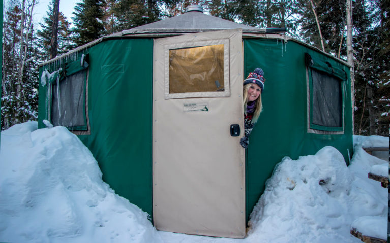 Lindsay Peeking Outside of the Yurt at Windy Lake Provincial Park :: I've Been Bit! Travel Blog