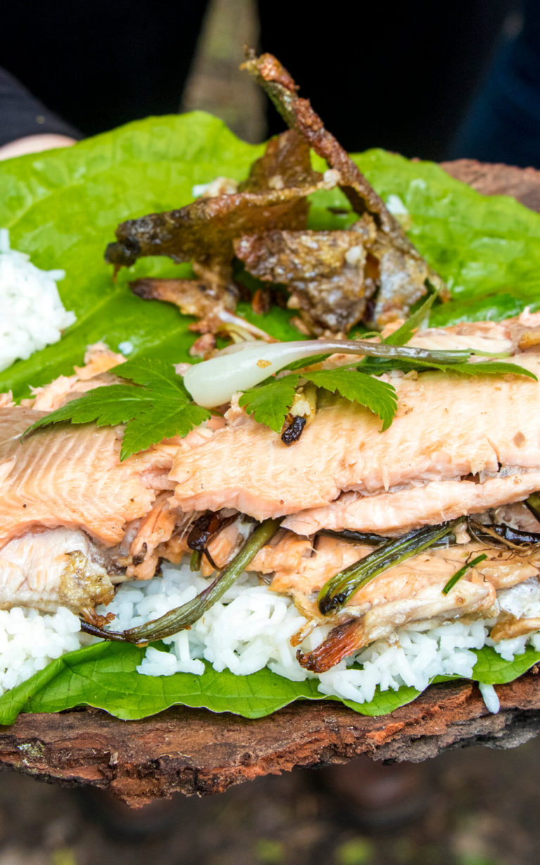 Cooked Trout with Leeks on a Bed of Rice Sitting On Top of a Leaf :: I've Been Bit! Travel Blog