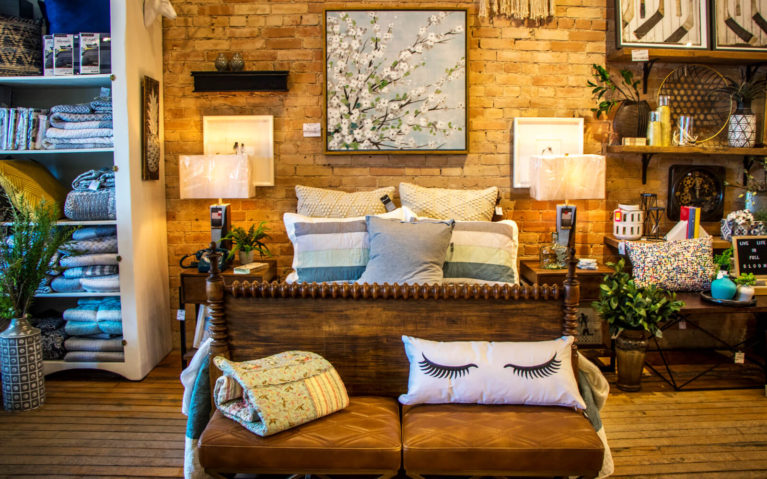 Example Bedroom Set Up with Exposed Brick Wall and Beautiful Furnishings at Jillian's Home Decor Store in Mitchell Ontario Canada :: I've Been Bit! Travel Blog