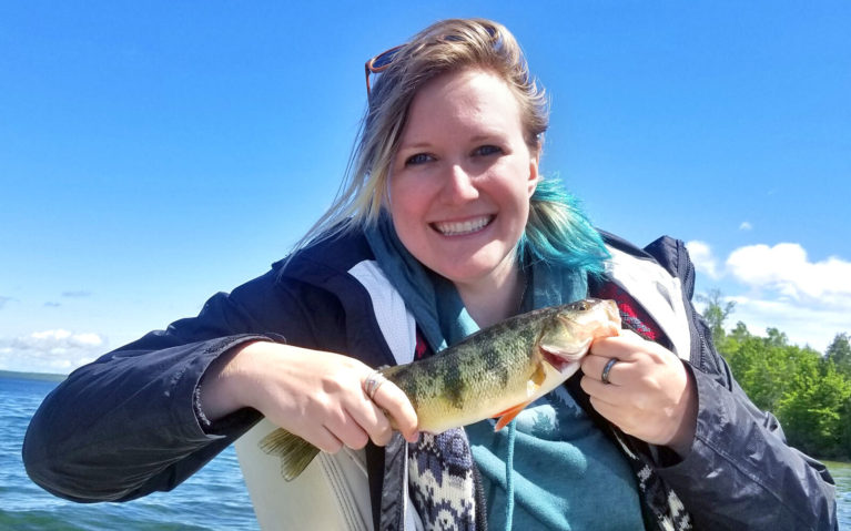 Lindsay Holding a Perch on Lake Kagawong Manitoulin Island :: I've Been Bit! Travel Blog