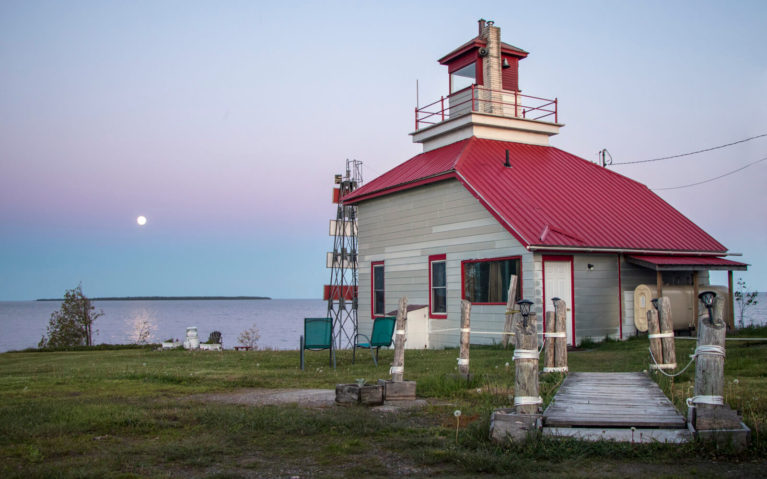 McKay Lighthouse at Sunset with the Moon in the Sky On the First Night of our Fishing Adventure in Northern Ontario :: I've Been Bit! Travel Blog