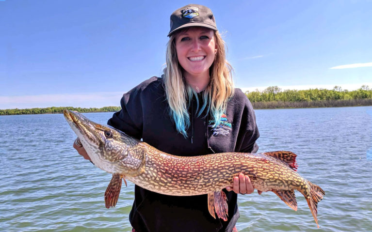 Lindsay Holding 'Big Bertha' the Pike During Her Northern Ontario Fishing Experience :: I've Been Bit! Travel Blog