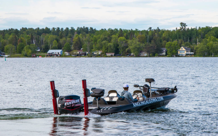 Adam, the Northern Ontario Fishing Guide of Angling Algoma, Taking Off Into the Waters of Lake Huron :: I've Been Bit! Travel Blog