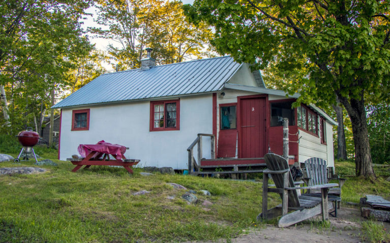 White Cottage with Red Trim That Lindsay Stayed In While Visiting Bruce Mines :: I've Been Bit! Travel Blog