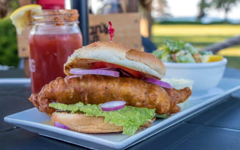 Cod Sandwich with a Caesar Salad and Caesar Drink on the Patio at Dockside Willie's in Bluewater Park, Wiarton :: I've Been Bit! Travel Blog