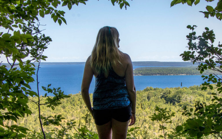 Lindsay Overlooking Colpoy's Bay from the Skinners Bluff Trail :: I've Been Bit! Travel Blog