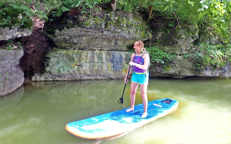 Lindsay on a Paddleboard in Moraine State Park with SurfSUP Adventures :: I've Been Bit! Travel Blog