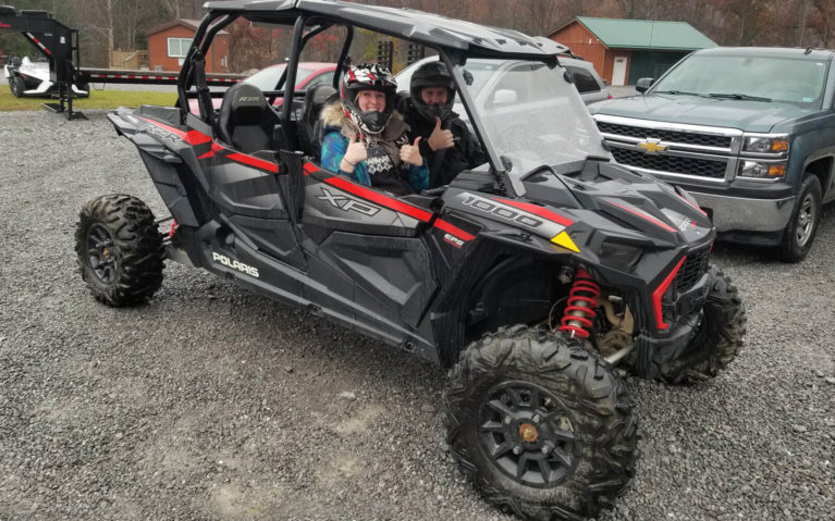 Lindsay Giving the Thumbs Up in a Side By Side with Trailhead ATV :: I've Been Bit! Travel Blog