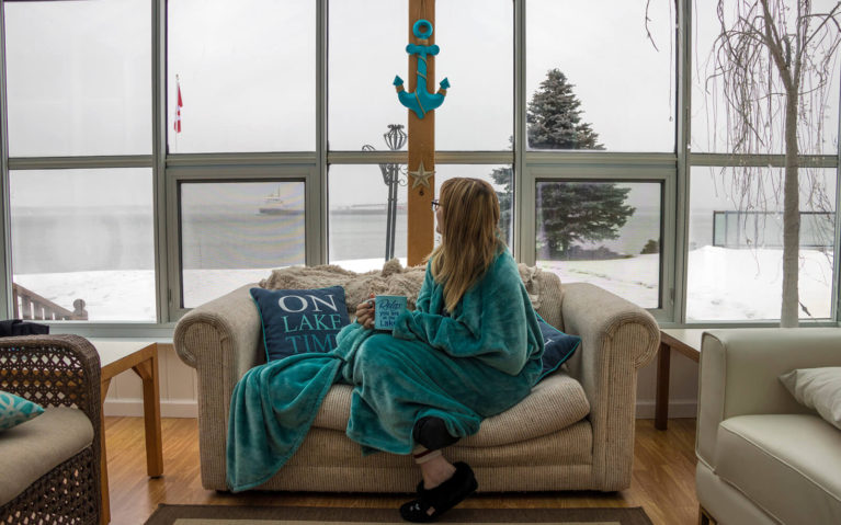 Lindsay Watching Freighters Go By Inside a Cottage Sunroom :: I've Been Bit! Travel Blog