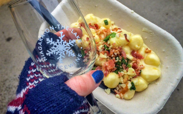 Hand Holding Niagara Icewine Fest Glass and Potato Gnocchi :: I've Been Bit! Travel Blog