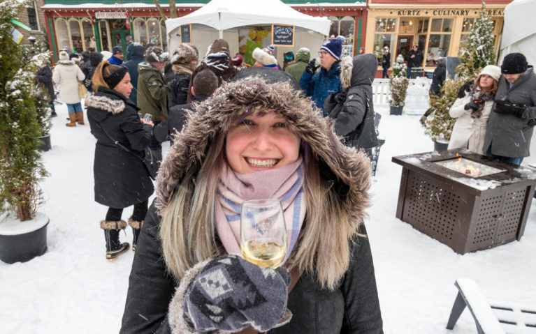 Lindsay Holding Glass of Icewine at the Niagara Icewine Festival :: I've Been Bit! Travel Blog
