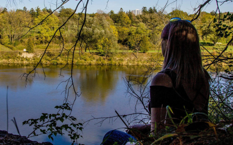 Lindsay Sitting At a Lookout Over the Grand River :: I've Been Bit! Travel Blog