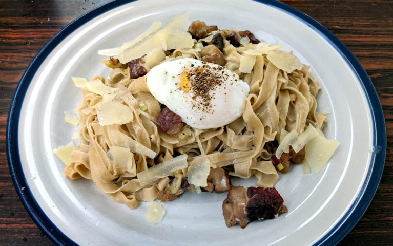 Flat Noodles on a White Plate with Beef, an Egg and Parmesan Shavings :: I've Been Bit! Travel Blog