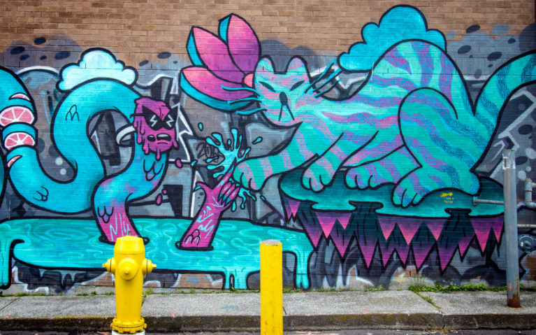Cyan and Magenta Mural with a Cat and Snake :: I've Been Bit! Travel Blog