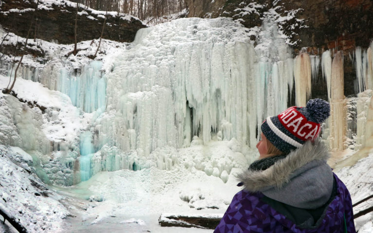 Lindsay In Front of a Frozen Tiffany Falls in Hamilton :: I've Been Bit! Travel Blog