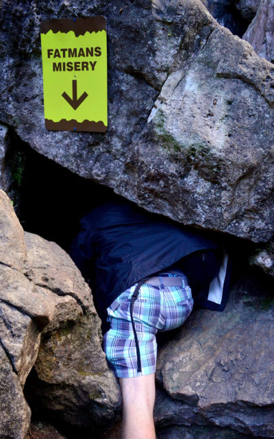Robin's Butt Squeezing into Fat Man's Misery :: I've Been Bit! Travel Blog