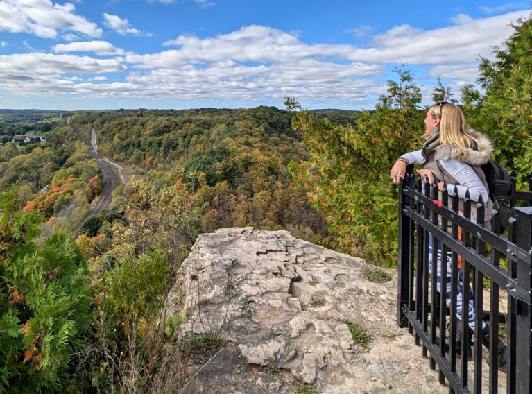 Lindz Enjoying the Views Behind the Fence at Dundas Peak :: I've Been Bit! Travel Blog