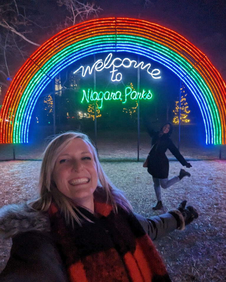 Lindz and Friend in Front of the Niagara Parks Rainbow Light Display :: I've Been Bit! Travel Blog