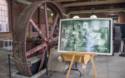 Engine Artifact Beside Photo of Old Electrical Pumphouse from 1930s :: I've Been Bit! Travel Blog