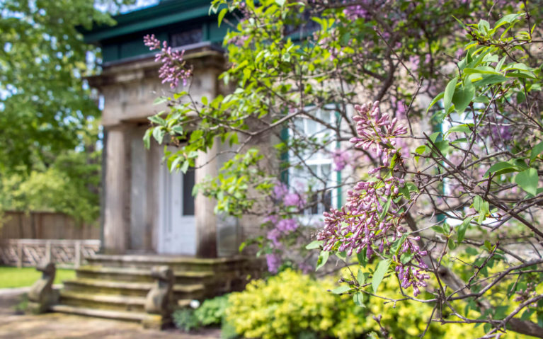 Flowers in Bloom in Front of a House in Paris Ontario :: I've Been Bit! Travel Blog