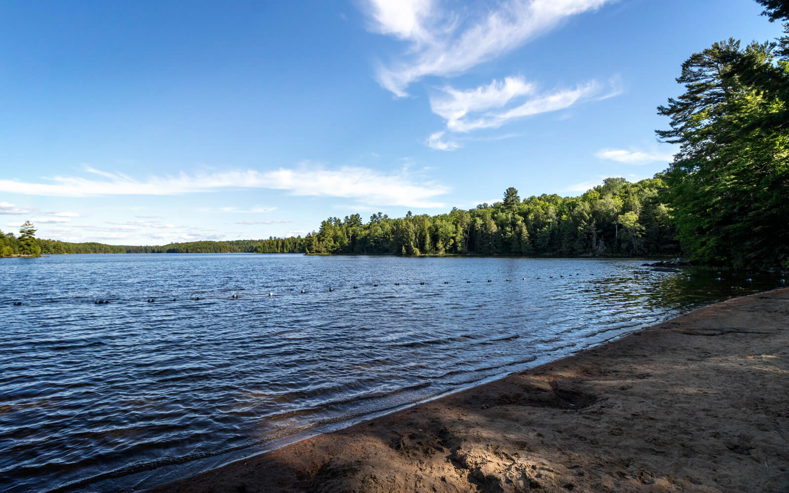 Blue Skies Over the Calm Waters of Silent Lake Provincial Park :: I've Been Bit! Travel Blog