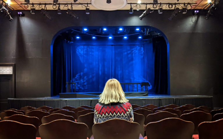 Lindsay Sitting Inside Theatre Orangeville :: I've Been Bit! Travel Blog