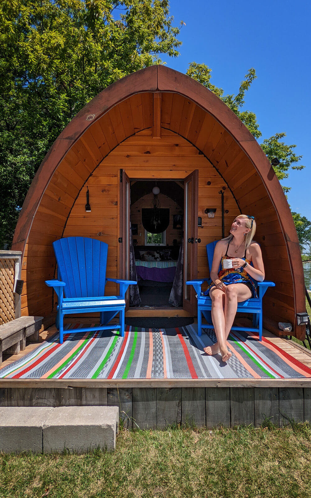 Lindsay Sitting Outside the Fox Pod Den :: I've Been Bit! Travel Blog