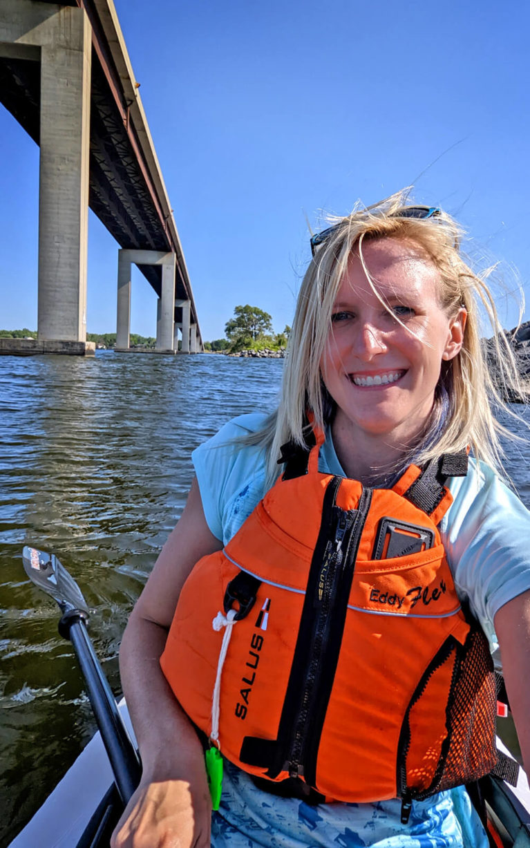 Lindsay Paddling Under the Belleville Bay Bridge :: I've Been Bit! Travel Blog