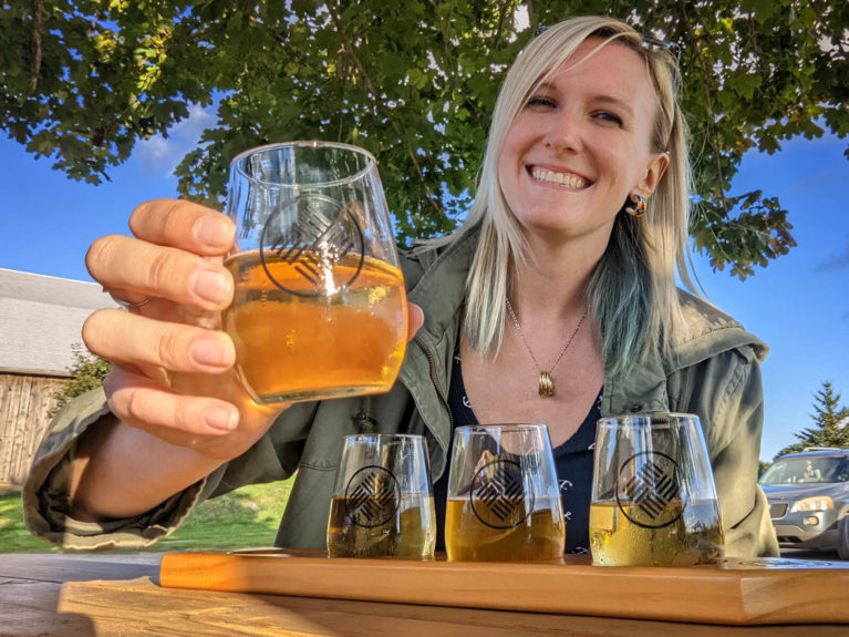 Lindsay Cheers-ing with a Two Blokes Cider Flight :: I've Been Bit! Travel Blog