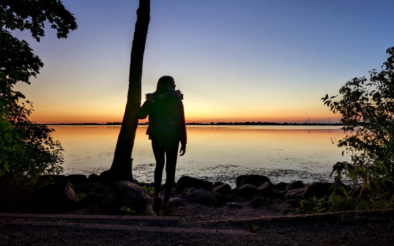 Lindsay Watching the Sunset on Rondeau Bay :: I've Been Bit! Travel Blog