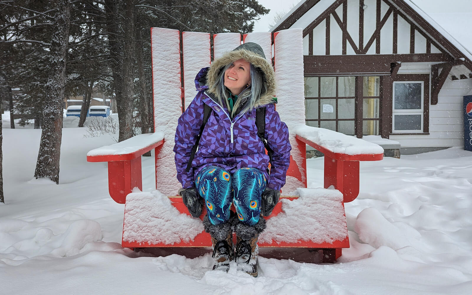Lindsay Hanging Out in the Red Chair in Wasagaming :: I've Been Bit! Travel Blog