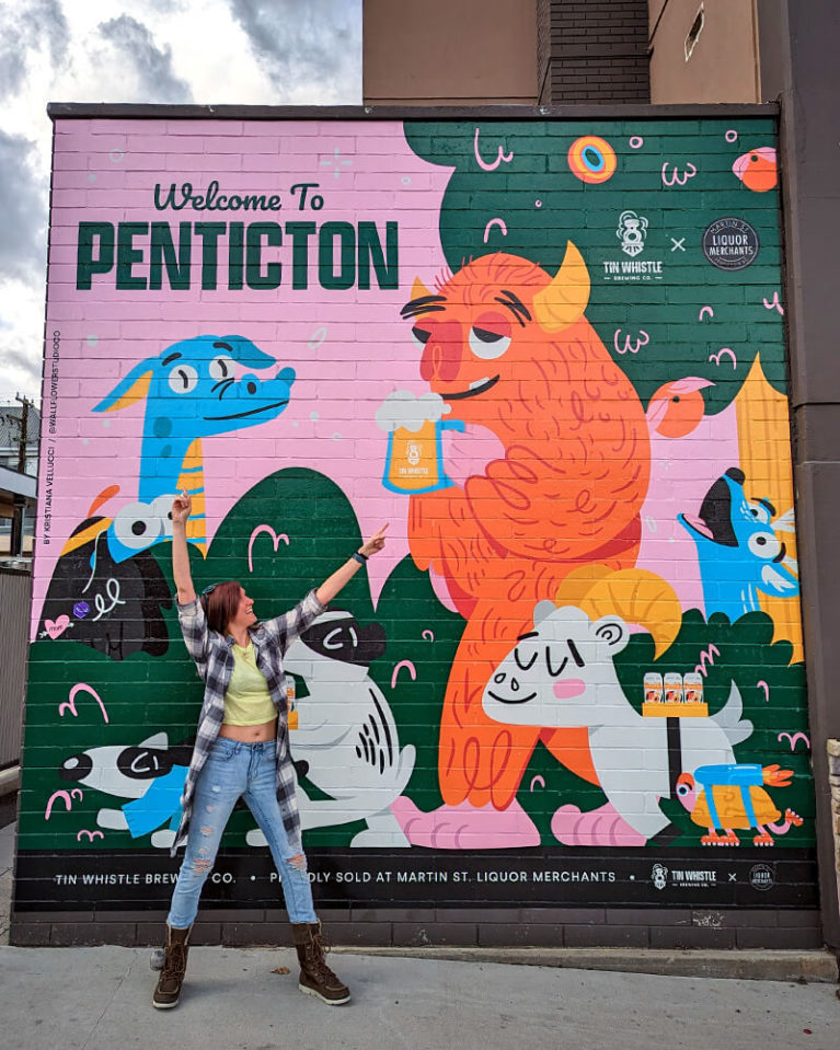 Lindsay with the Welcome to Penticton Mural :: I've Been Bit! Travel Blog