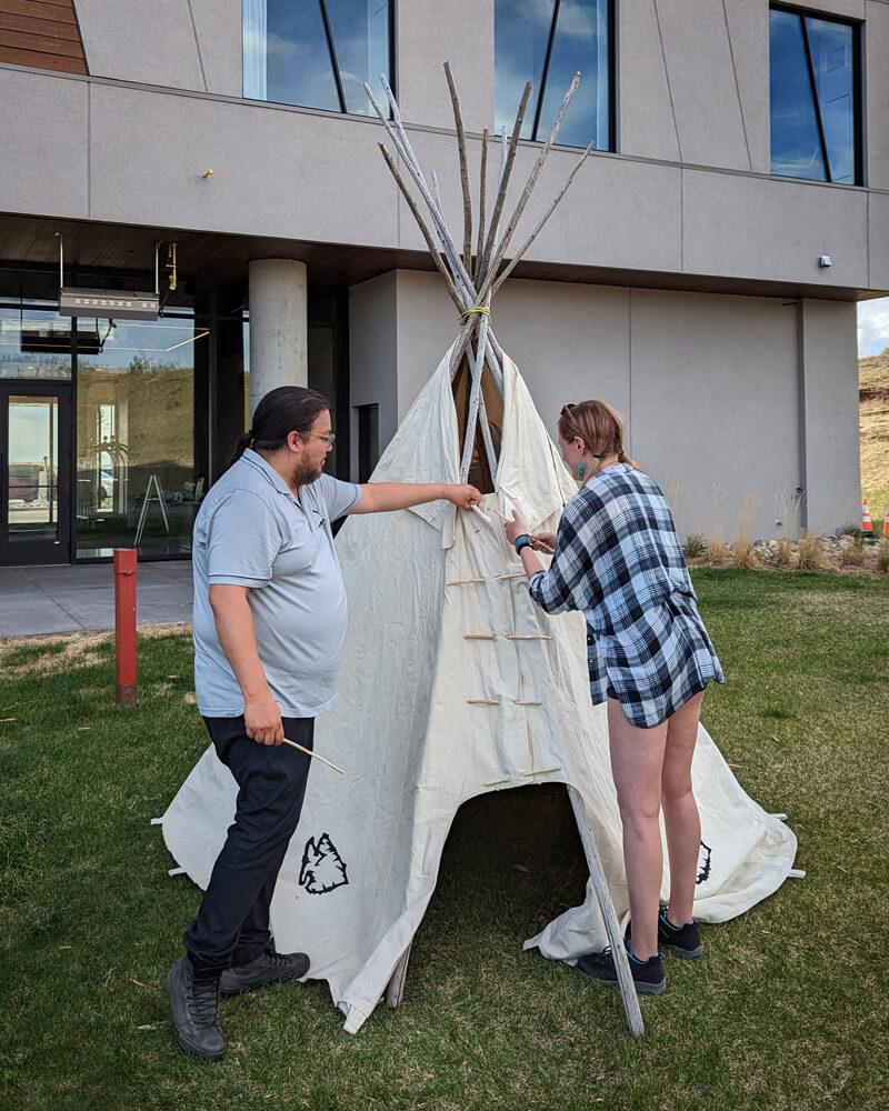 Lindsay Connecting the Exterior of the Tipi :: I've Been Bit! Travel Blog