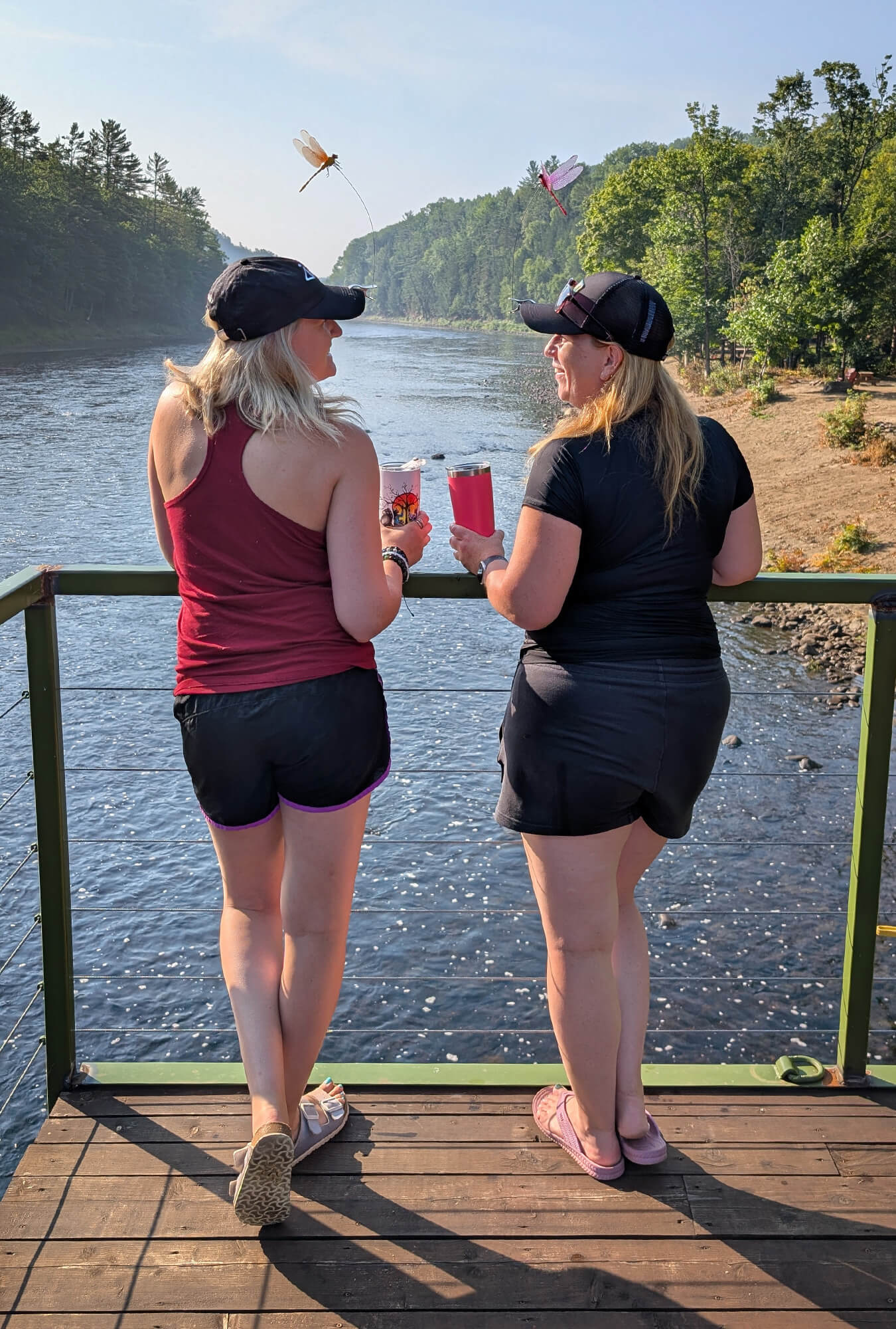 Lindz & Kat Enjoying a Morning Coffee from the Lookout at Aventure Coulonge :: I've Been Bit! Travel Blog