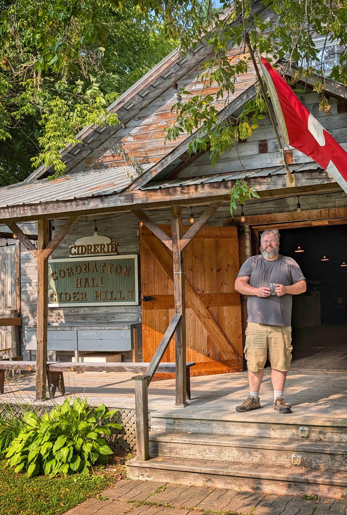 Greg Standing on the Steps of Coronation Hall in Bristol Quebec :: I've Been Bit! Travel Blog